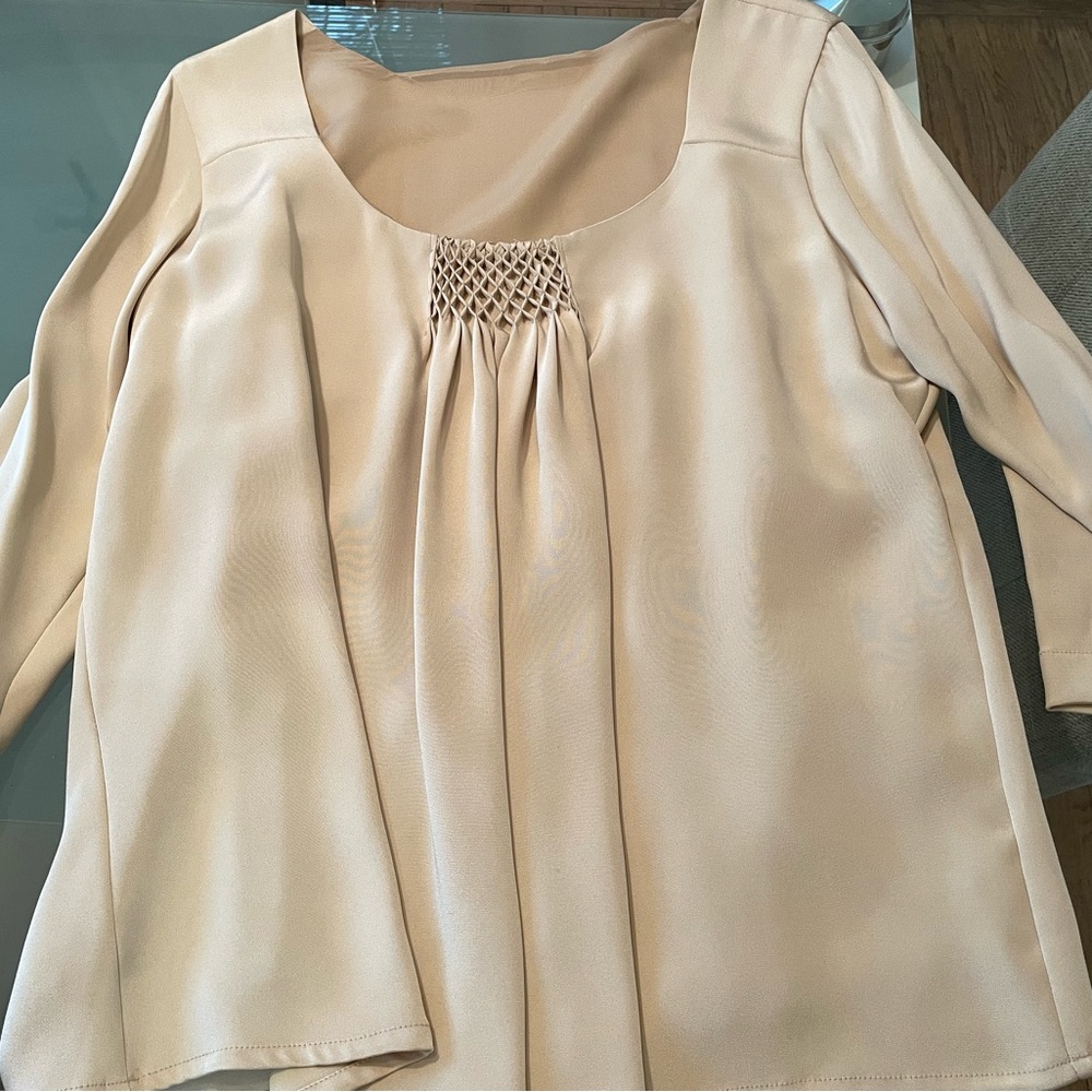 Elegant women’s blouse soft fabric with chiffon lining.